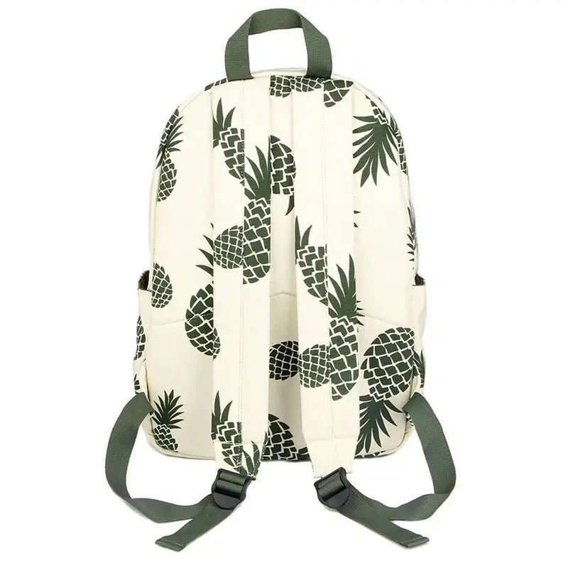 Cartable ananas avec motif de ananas verts, fond beige, bretelles vertes et poignée