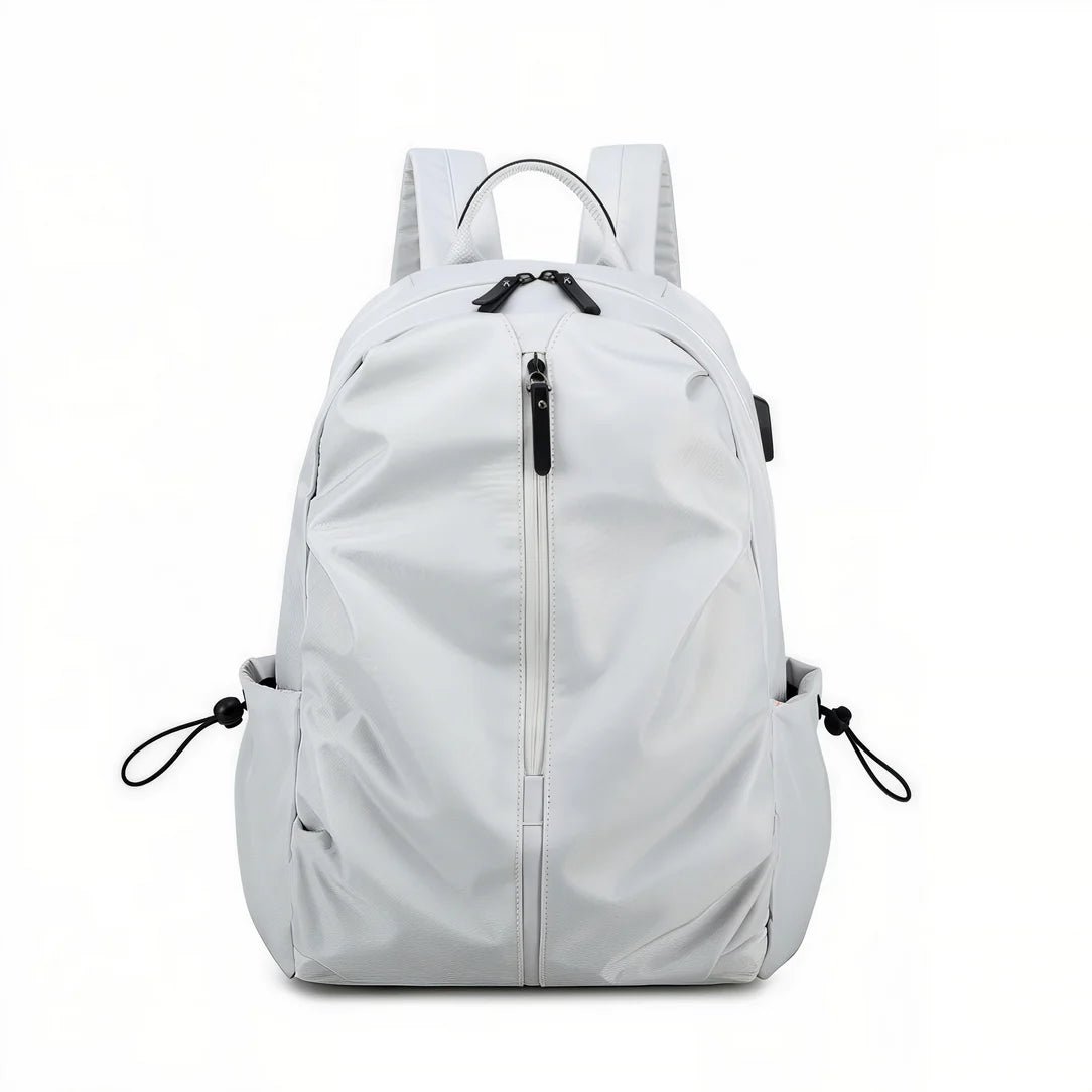 Sac à dos collège MoovePack gris clair minimaliste avec zippers noirs et port USB