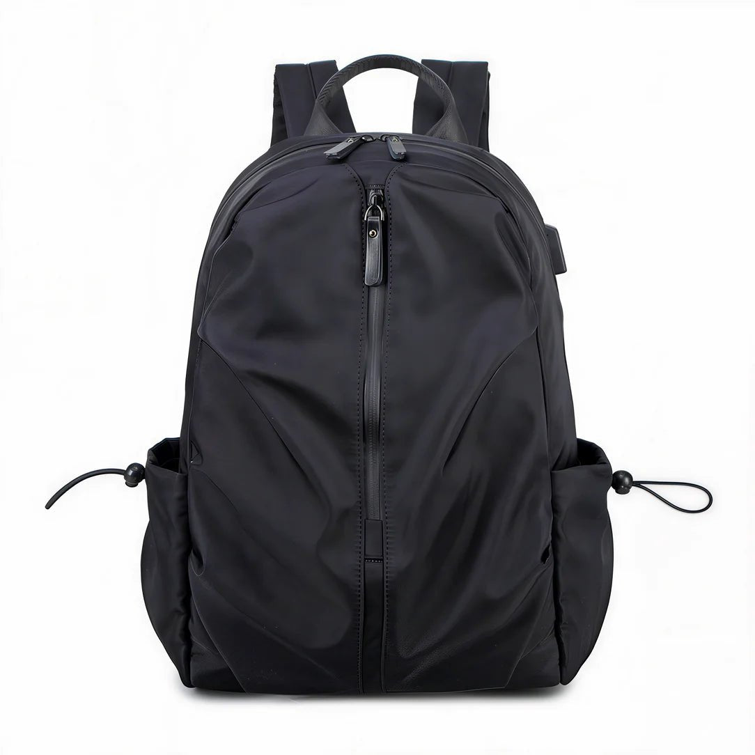 Sac à dos collège MoovePack en nylon noir avec fermeture verticale et poches latérales