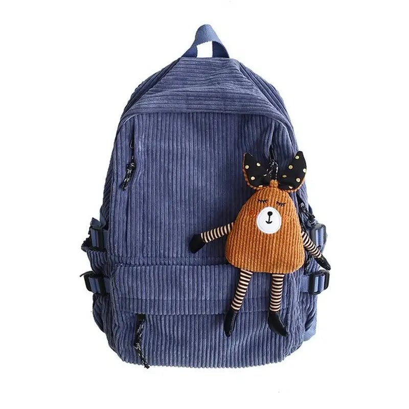 Sac à dos en velours bleu avec un porte-clés de peluche de cerf marron