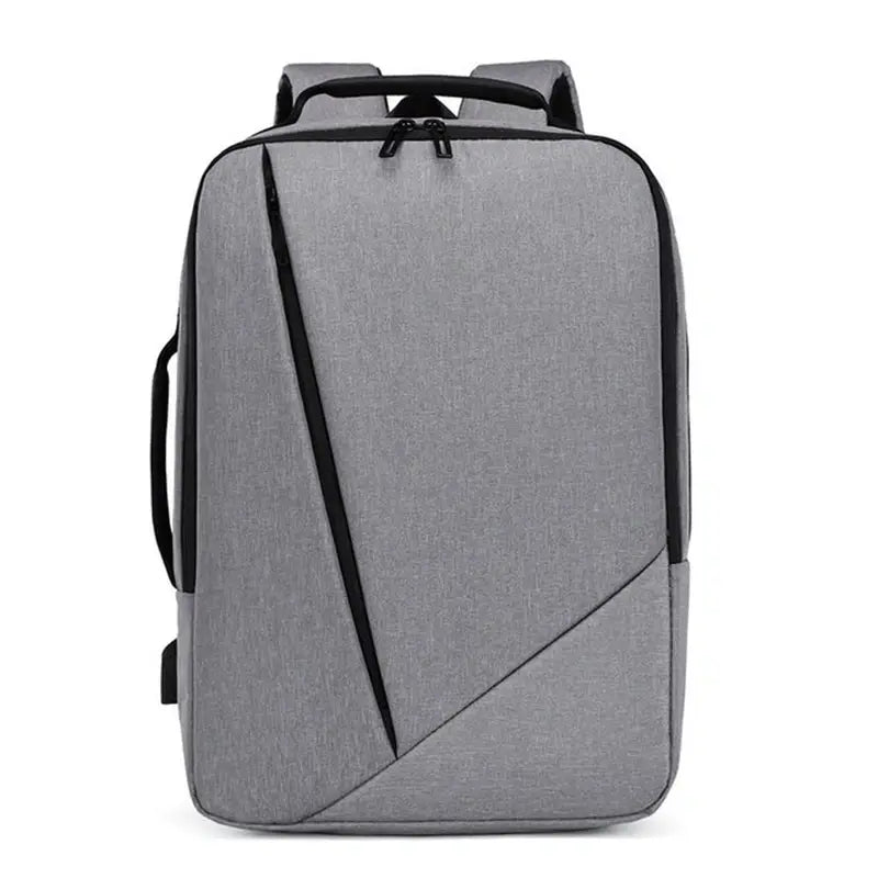 Sac à dos pour pc portable gris avec zippers noirs, design diagonal et poignée latérale