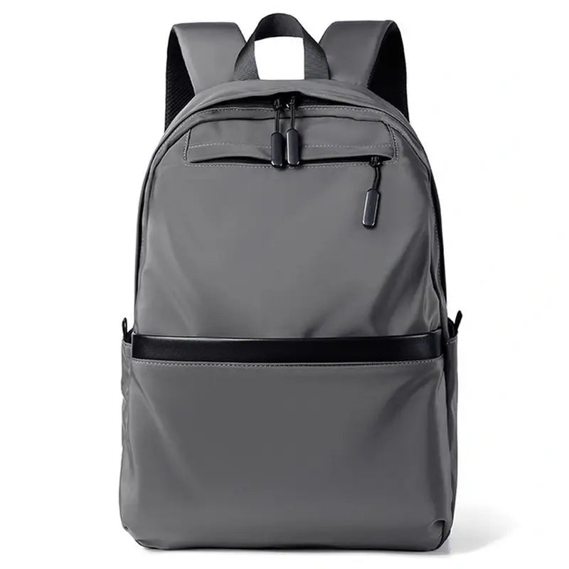 Sac à dos scolaire collège gris avec trim noir et multiples poches zippées