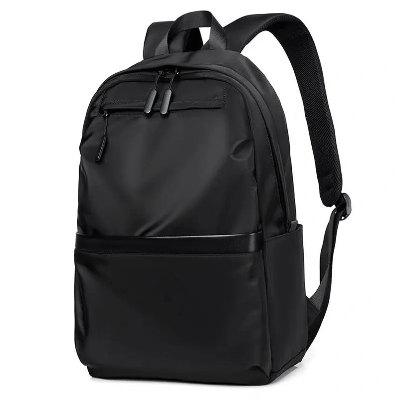 Sac à dos scolaire collège noir en nylon waterproof avec poches zippées et bretelles rembourrées