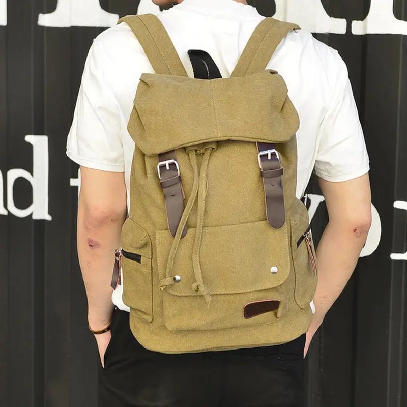 Sac à dos en toile kaki avec bretelles en cuir marron pour homme style décontracté
