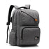 Cartable noir d école en tissu gris avec plusieurs compartiments et accents en cuir marron