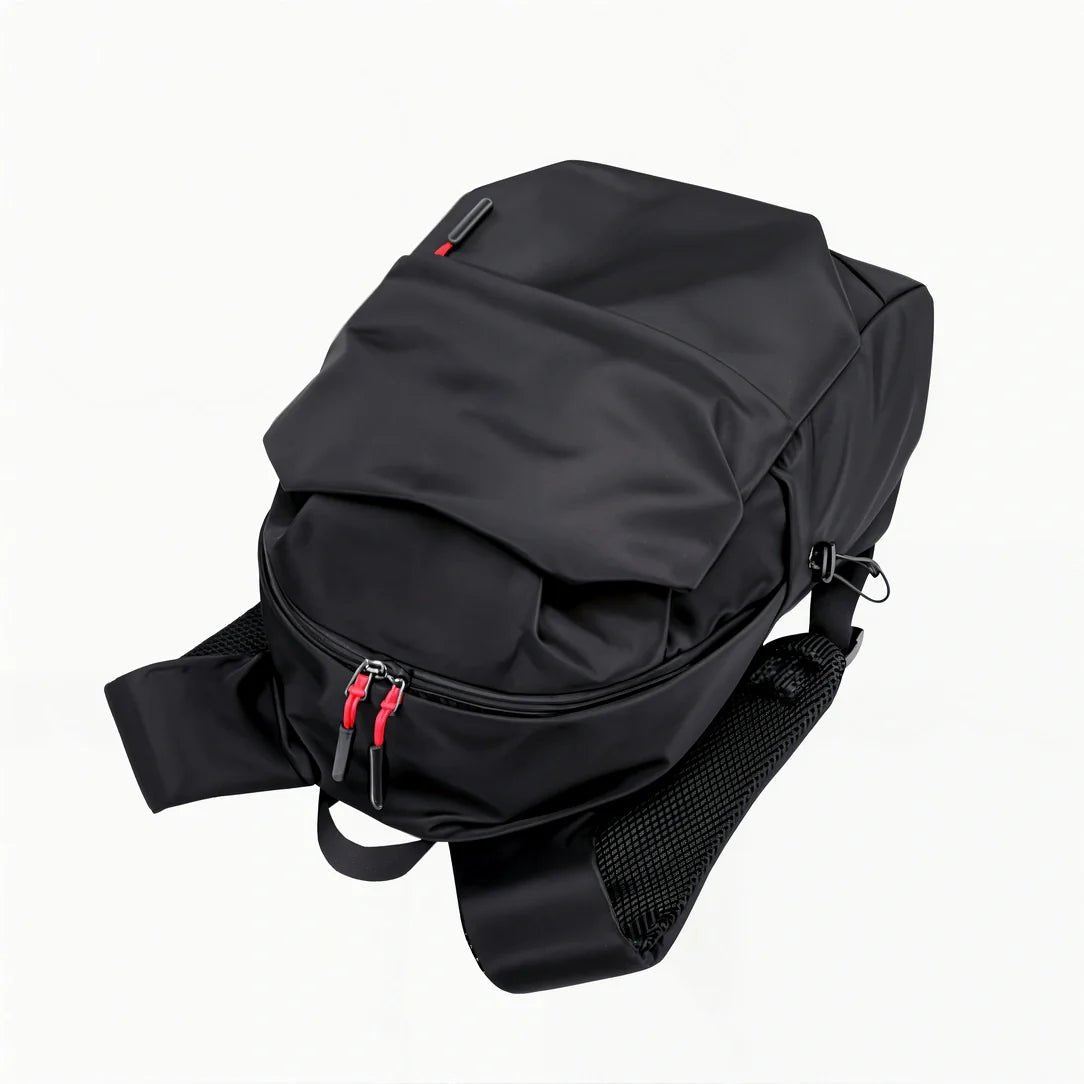 Sac à dos en nylon noir avec rabat supérieur et tirettes rouges pour ados et collégiens