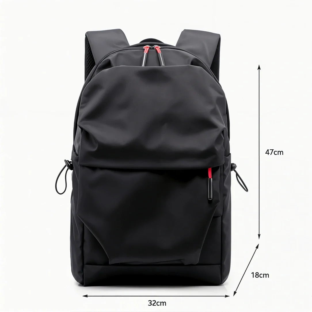 Sac à dos en nylon noir avec accents de fermeture éclair rouges et poches latérales à cordon pour ados et collégiens
