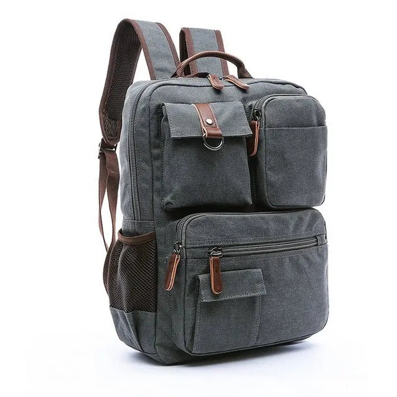 Sac à dos en toile gris foncé avec accents en cuir marron et poches extérieures