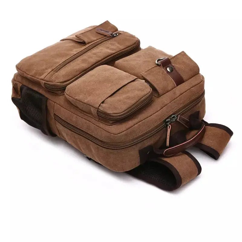 Sac à dos en toile marron pour homme avec poches zippées et accents en cuir