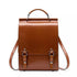 Sac à dos en cuir vintage marron avec poignée supérieure et boucles sur le rabat