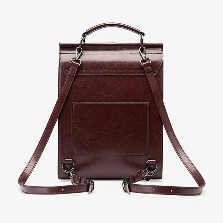 Cartable vintage en cuir en cuir marron avec poche extérieure et bretelles ajustables