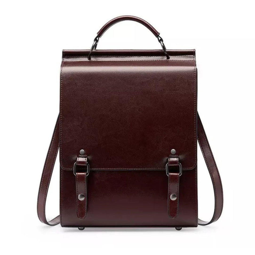 Sac à dos ordinateur cartable vintage femme ciré apolline en cuir bordeaux avec fermoirs boucles argentées