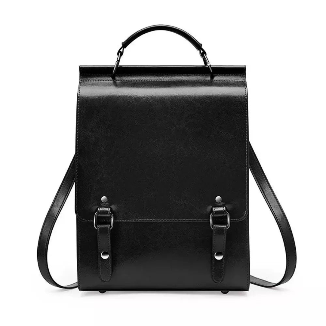 Sac à dos ordinateur vintage femme en cuir noir avec poignées supérieures et deux rabats à boucles apolline ciré