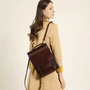 Sac à dos ordinateur en cuir ciré marron foncé avec forme rectangulaire et deux fermetures à rabat apolline vintage