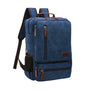 Sac à dos vintage bleu en toile avec accents cuir marron et fermetures éclair