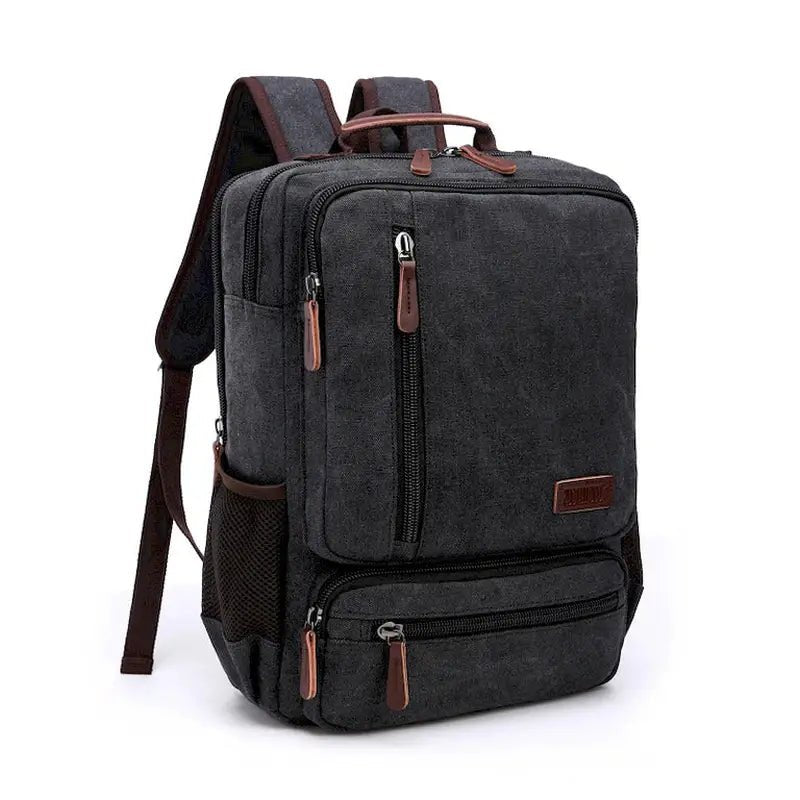 Sac à dos vintage homme en toile gris foncé avec accents en cuir marron et multiples compartiments zippés