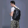 Sac à dos en cuir noir pour homme avec multiples compartiments élégants