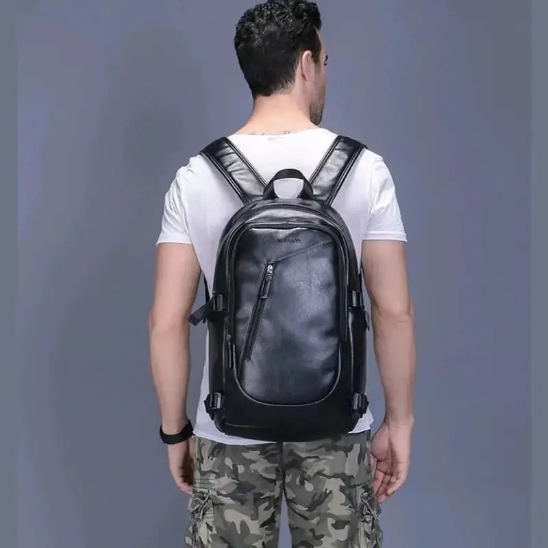Sac à dos homme en faux cuir noir avec multiples zips et bretelles réglables