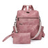 Sac à dos en cuir vintage rose avec plusieurs zips et porte-monnaie assorti