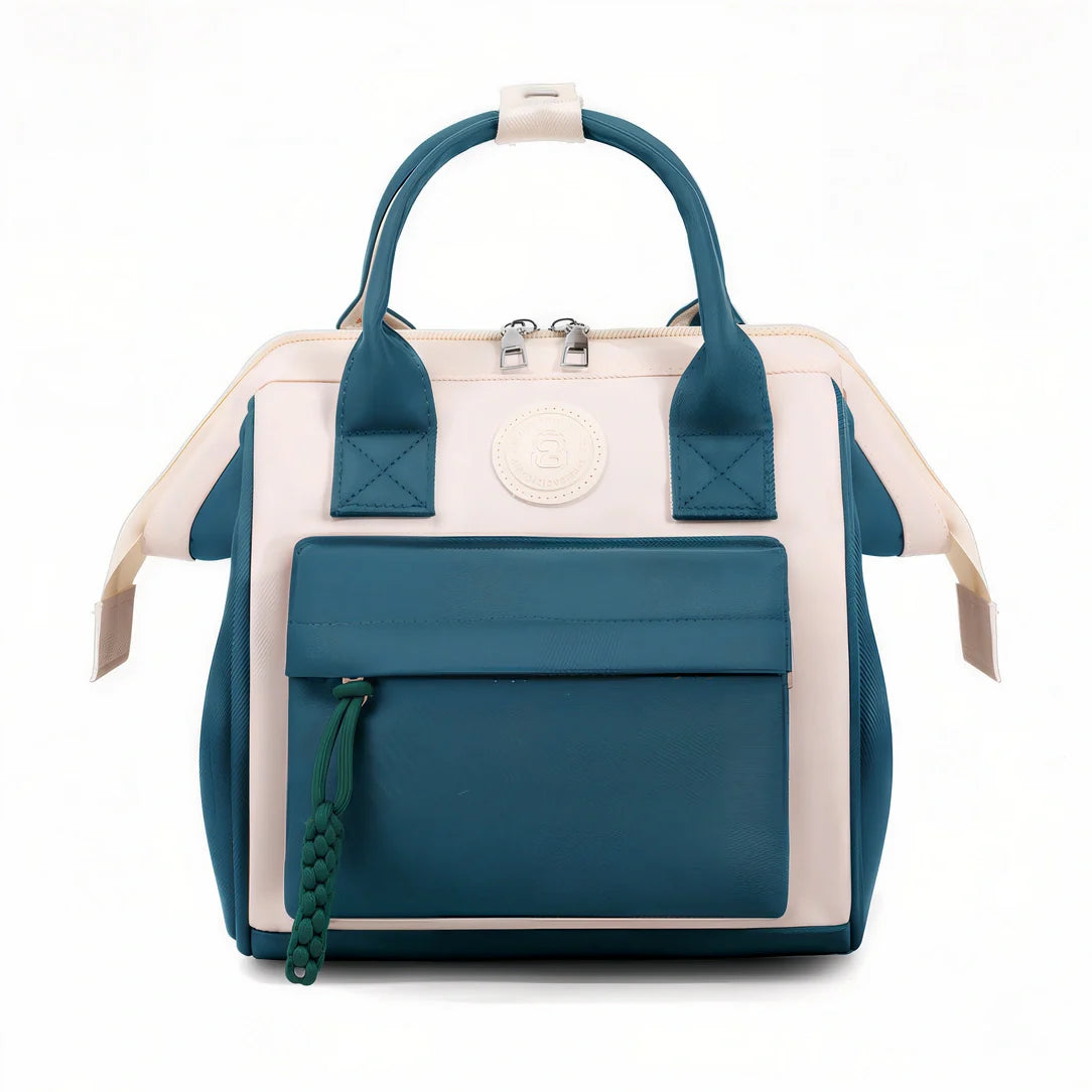 Sac à dos mini Plume Claire bleu et blanc avec accents cuir, zip et anse tressée