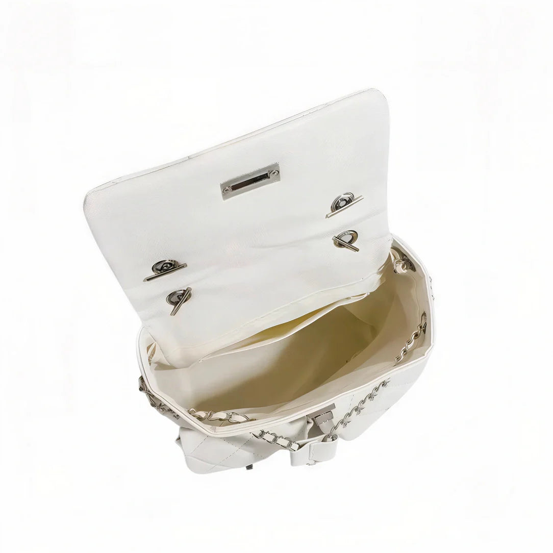 Petit sac à dos Granit en cuir blanc clouté avec ferrures argentées