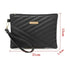Pochette femme en cuir noire matelassée avec dragonne et accessoires en or