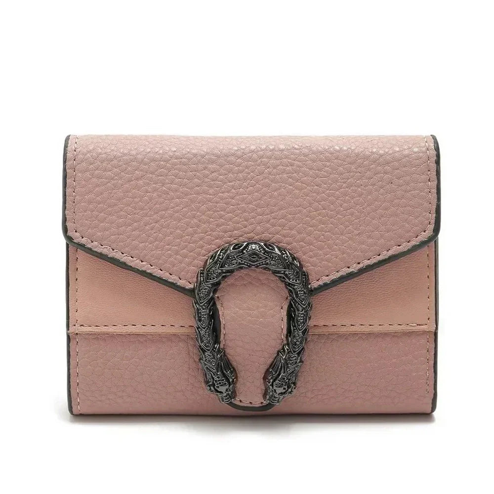 Portefeuille chic en cuir rose avec clasp en forme de fer à cheval en argent