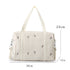 Sac à bandoulière en coton pour bébé avec sac de voyage matelassé blanc cassé et broderie florale