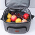 Sac à dos isotherme bandoulière gris avec sac de refroidissement rempli de fruits frais