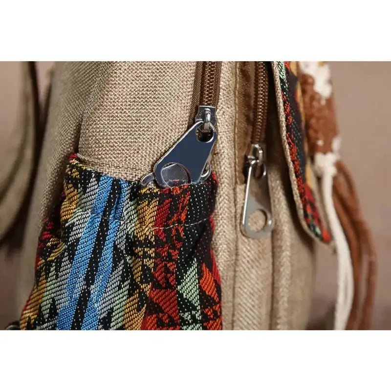 Sac à bandoulière vintage en textile beige avec poches colorées et zippers apparents