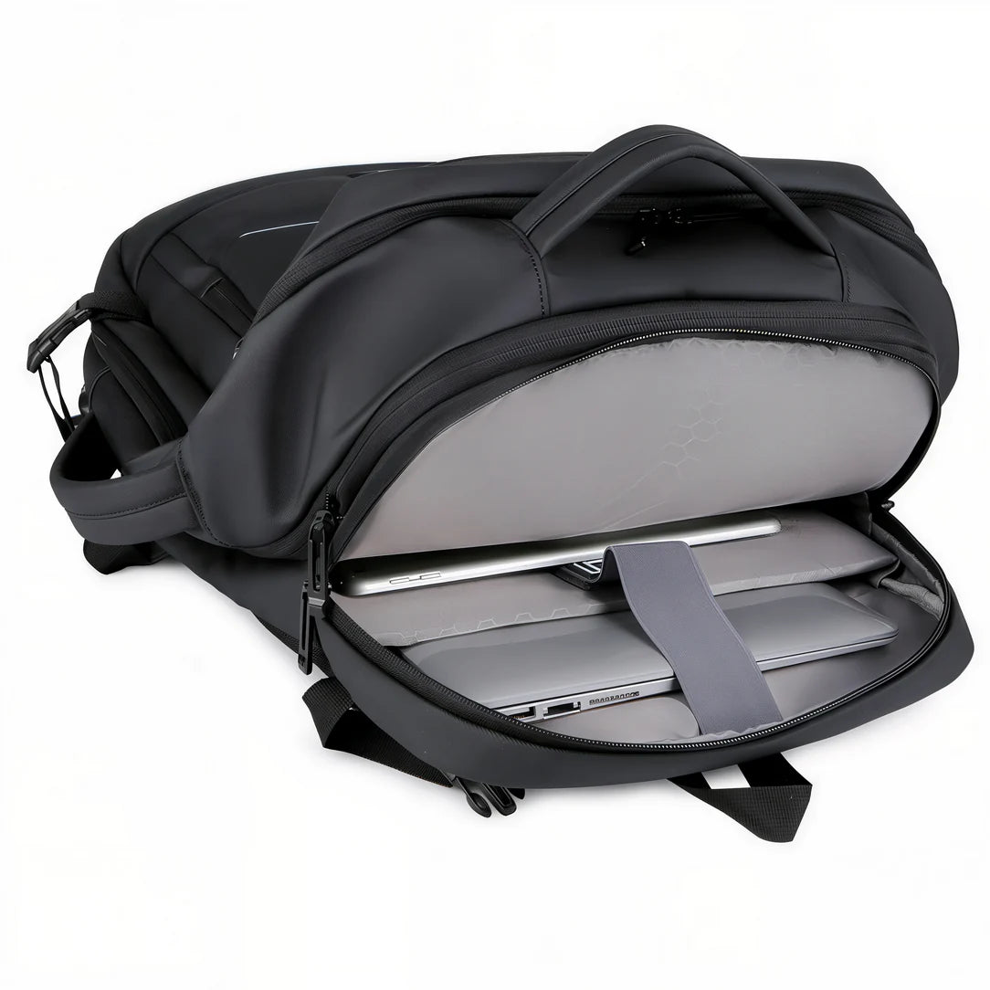 Sac à dos 17 avec compartiment PC ouvert montrant un ordinateur portable et une tablette