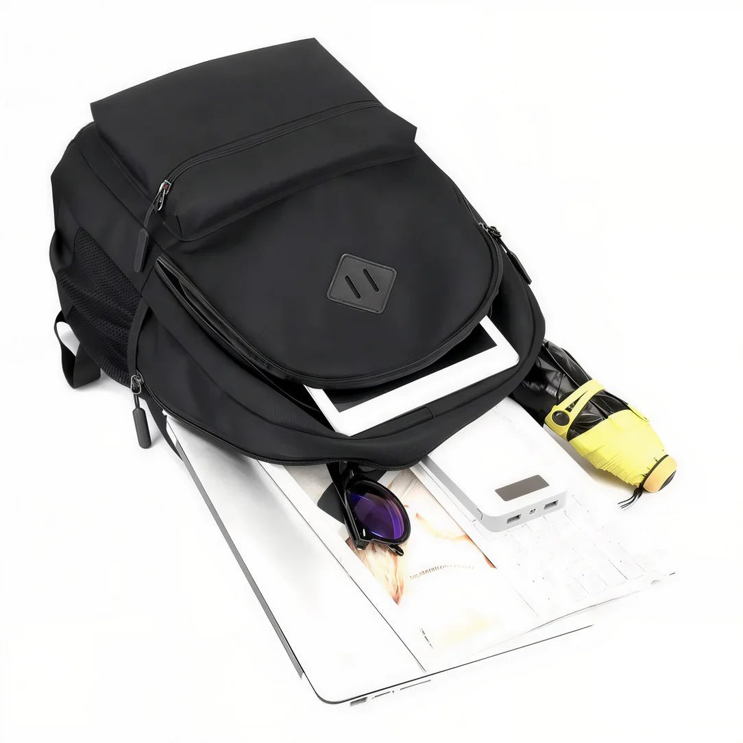 Sac à dos 2 compartiments collège en tissu noir avec plusieurs poches pour électroniques