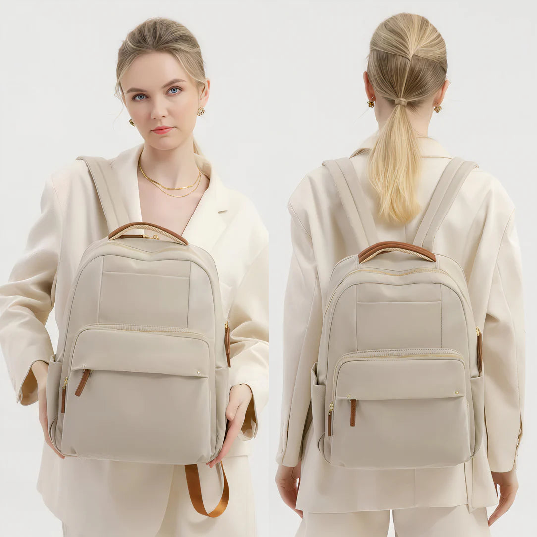 Sac à dos Amber en toile beige avec accents en cuir marron et bretelles réglables