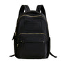 Sac à dos Amber en nylon noir avec zippers et bretelles dorés