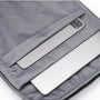 Housse dordinateur grise avec plusieurs compartiments pour ordinateur portable et tablette