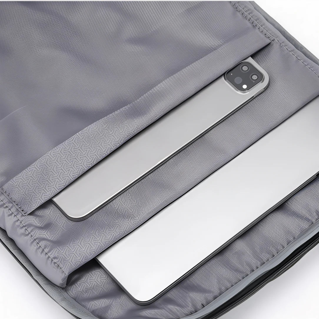 Housse dordinateur grise avec plusieurs compartiments pour ordinateur portable et tablette