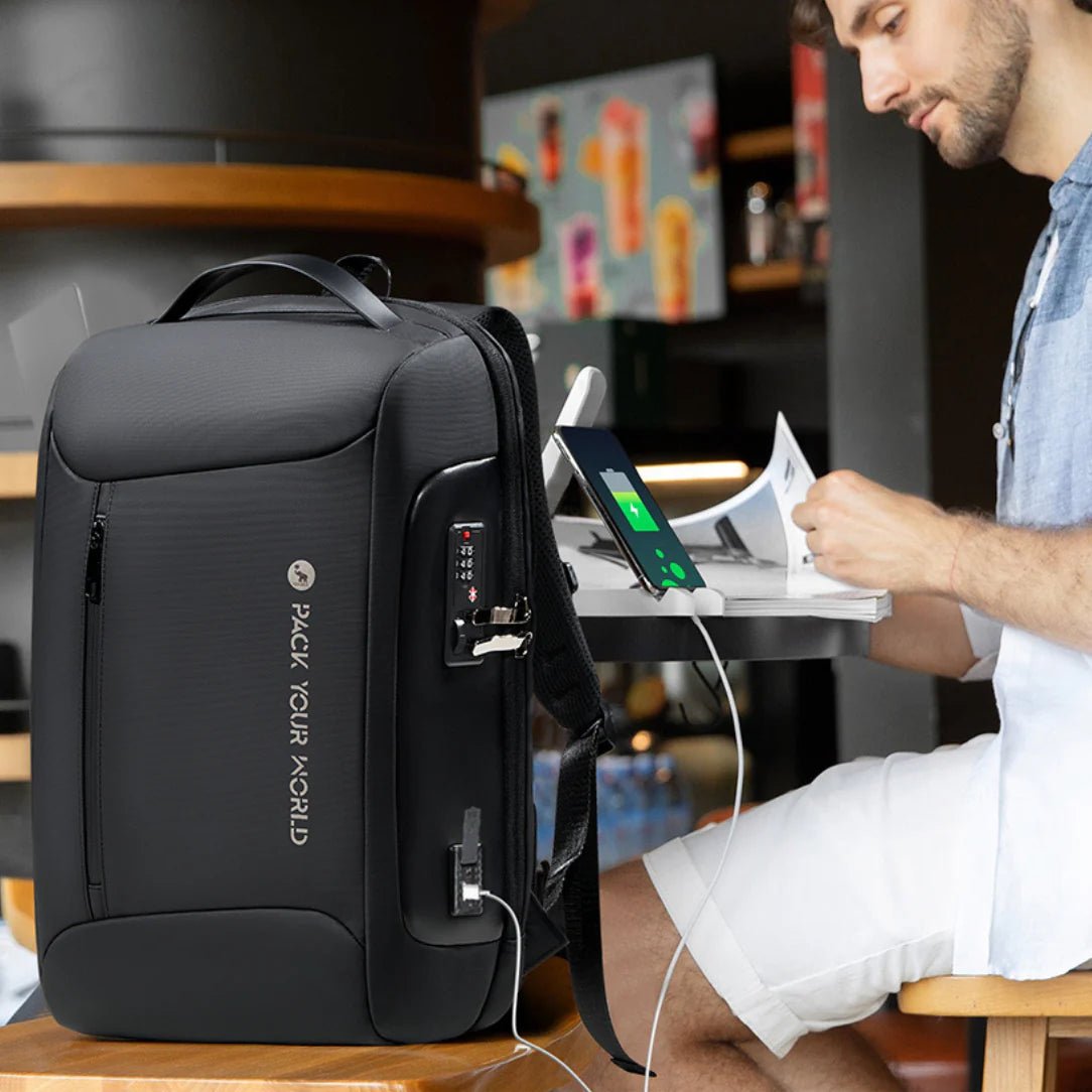 Sac à dos antivol noir avec port de chargement USB externe pour le Pack your world II