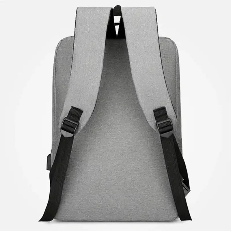 Sac à dos avec poche ordinateur gris, bretelles rembourrées et boucles ajustables