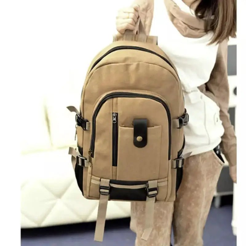 Sac à dos cartable homme en toile en canvas beige avec poches multiples et accents noirs