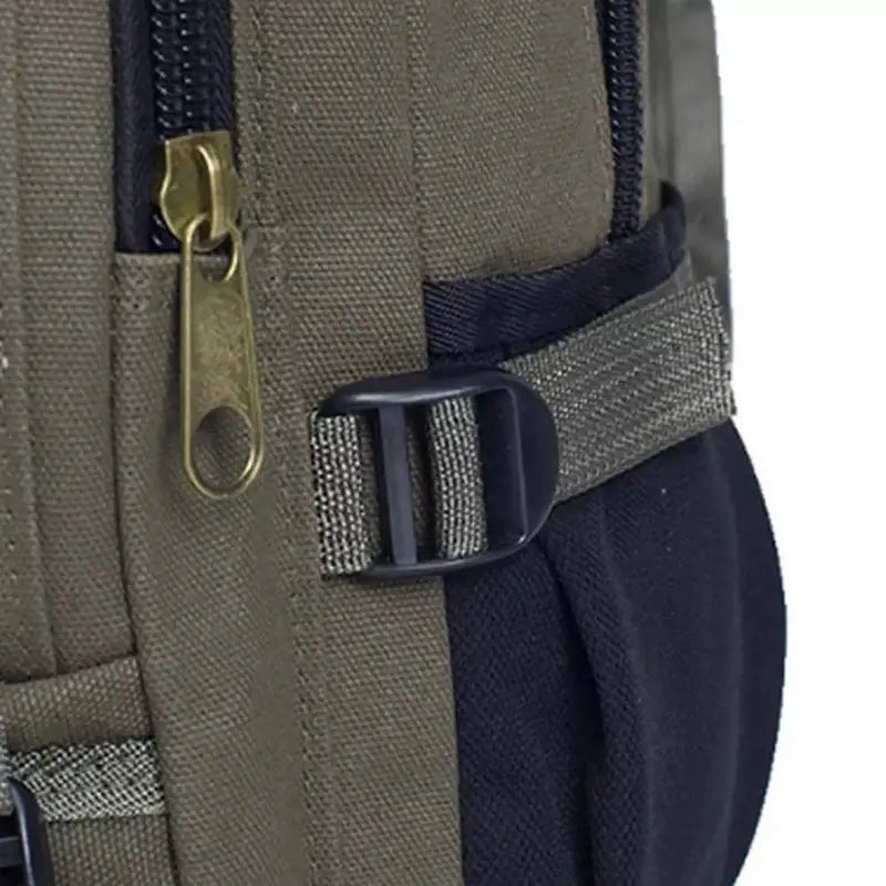 Sac à dos cartable homme en toile militaire verte avec fermeture en laiton et boucle en plastique