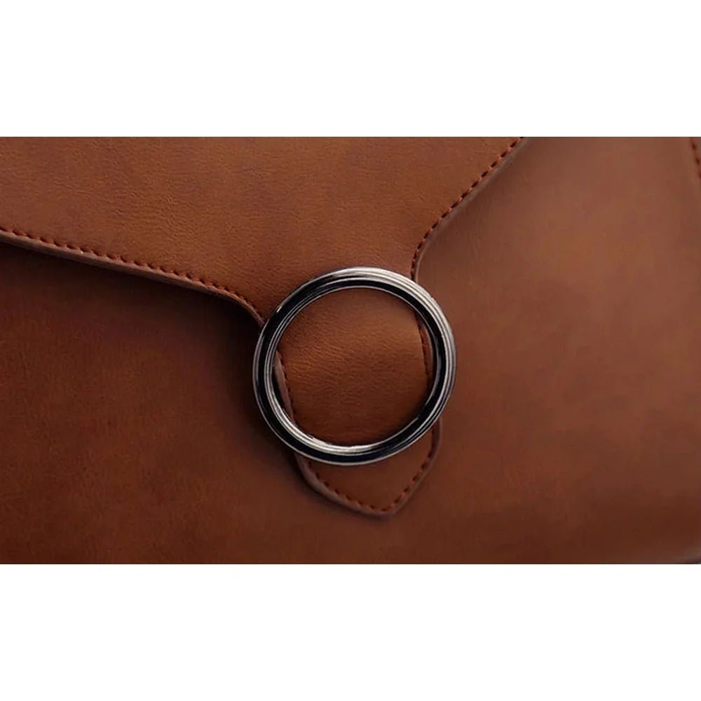 Sac à dos chic cuir en cuir marron avec boucle en anneau argenté