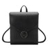 Sac à dos chic cuir en faux cuir noir avec rabat enveloppe et anneau en argent