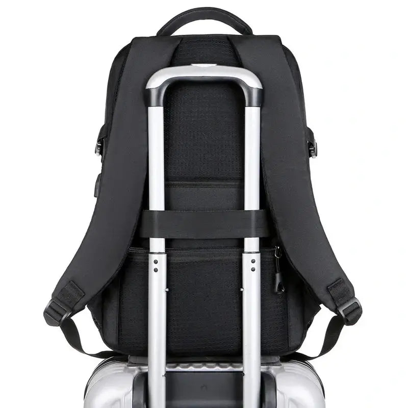 Sac à dos collège solide noir avec bretelles, poignée, et sangle pour valise en argent