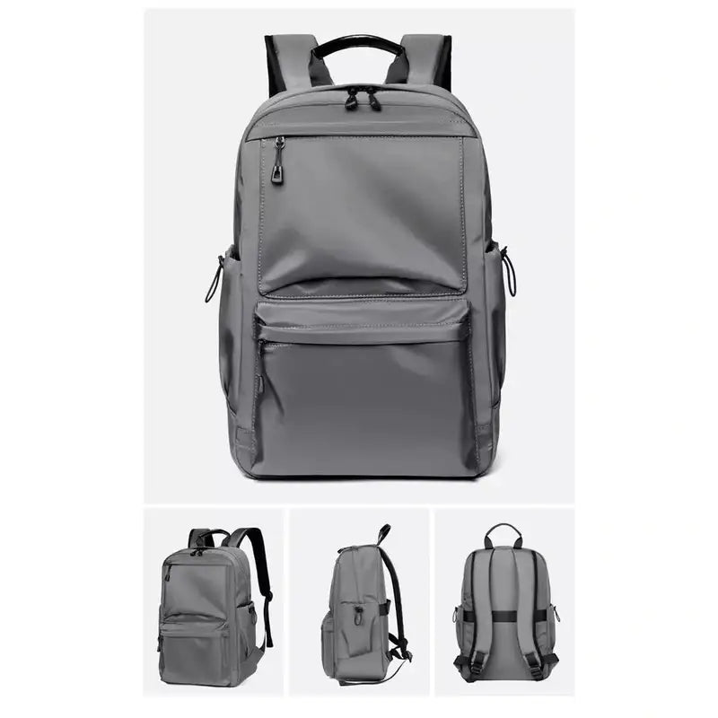Sac à dos cours gris avec multiples compartments et poignée supérieure