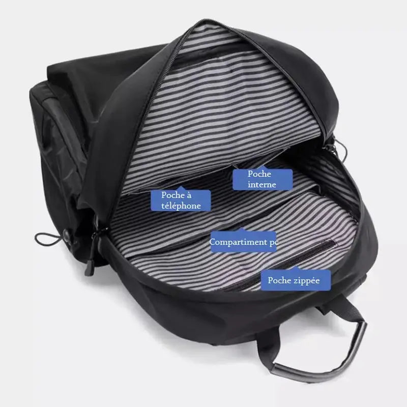 Sac à dos cours noir ouvert avec doublure rayée et multiples compartiments internes