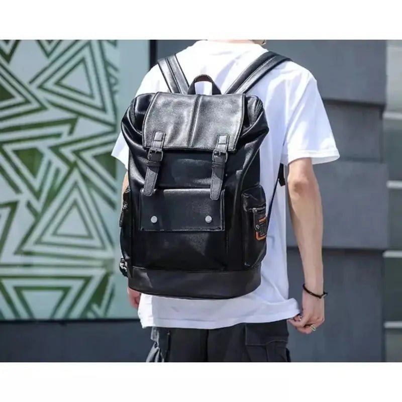 Sac à dos cuir homme décontracté en faux cuir noir avec boucles et poche frontale