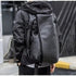 Sac à dos cuir homme luxe en cuir noir avec fermeture roulée et bretelles ajustables