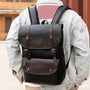 Sac à dos cuir pour homme en cuir noir et marron avec boucles