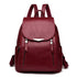 Sac à dos cuir souple en faux cuir marron avec hardware argenté et multiples poches zippées