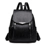 Sac à dos cuir souple avec poches zippées, hardware argenté et design élégant